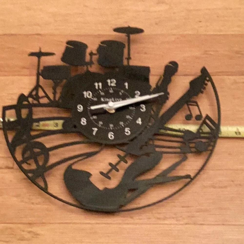 Kinglive battery operated musical montage clock in black and white white. 12”.